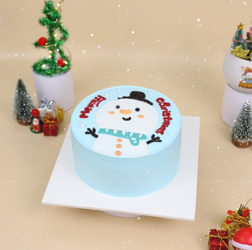 Bánh sinh nhật vẽ hình người tuyết tông màu xanh